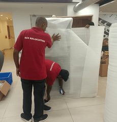 professionally packing the goods by two mens